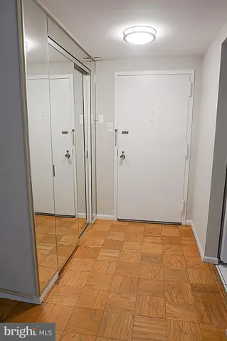 a view of a dining room with furniture and window