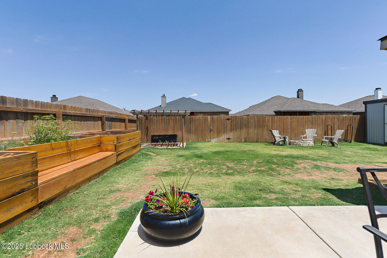 7348 100th Street Lubbock, TX 79424 - Photo 48 of 55 a front view of a house with a yard