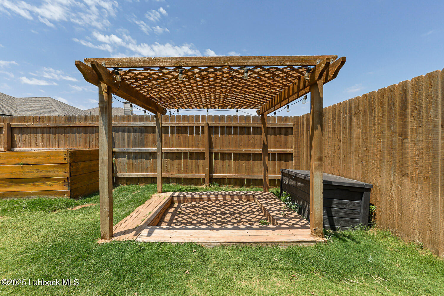 7348 100th Street Lubbock, TX 79424 - Photo 50 of 55 a view of a backyard with wooden fence