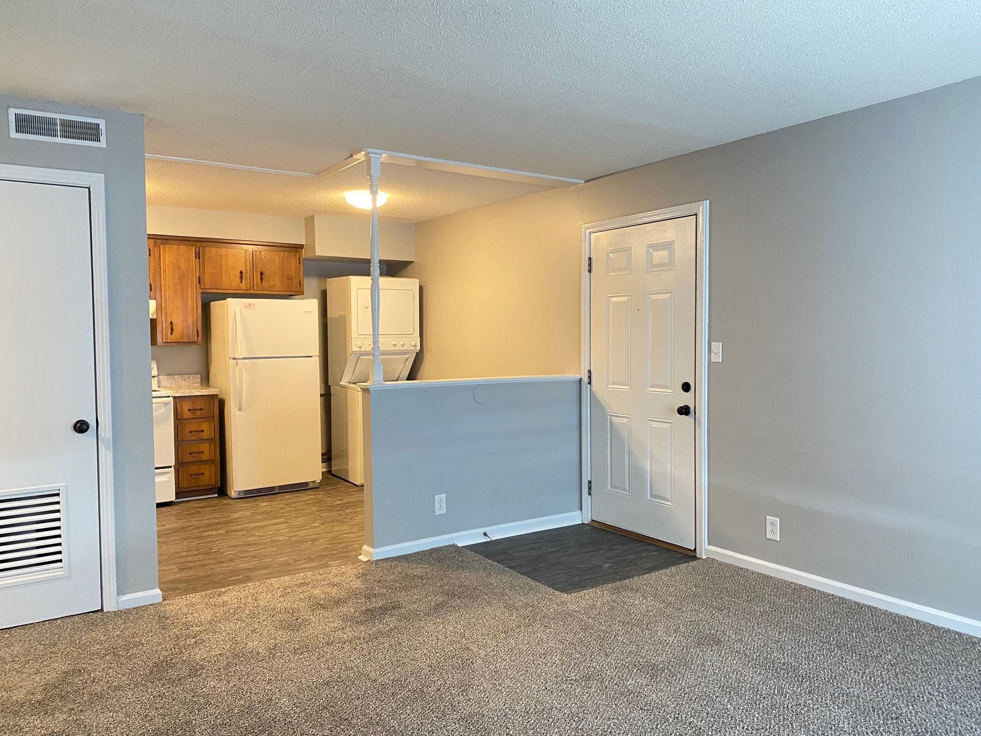 526 Main Street, Unit 6 Clarksville, TN 37040 - Photo 2 of 10 a view of a kitchen with a refrigerator and a sink