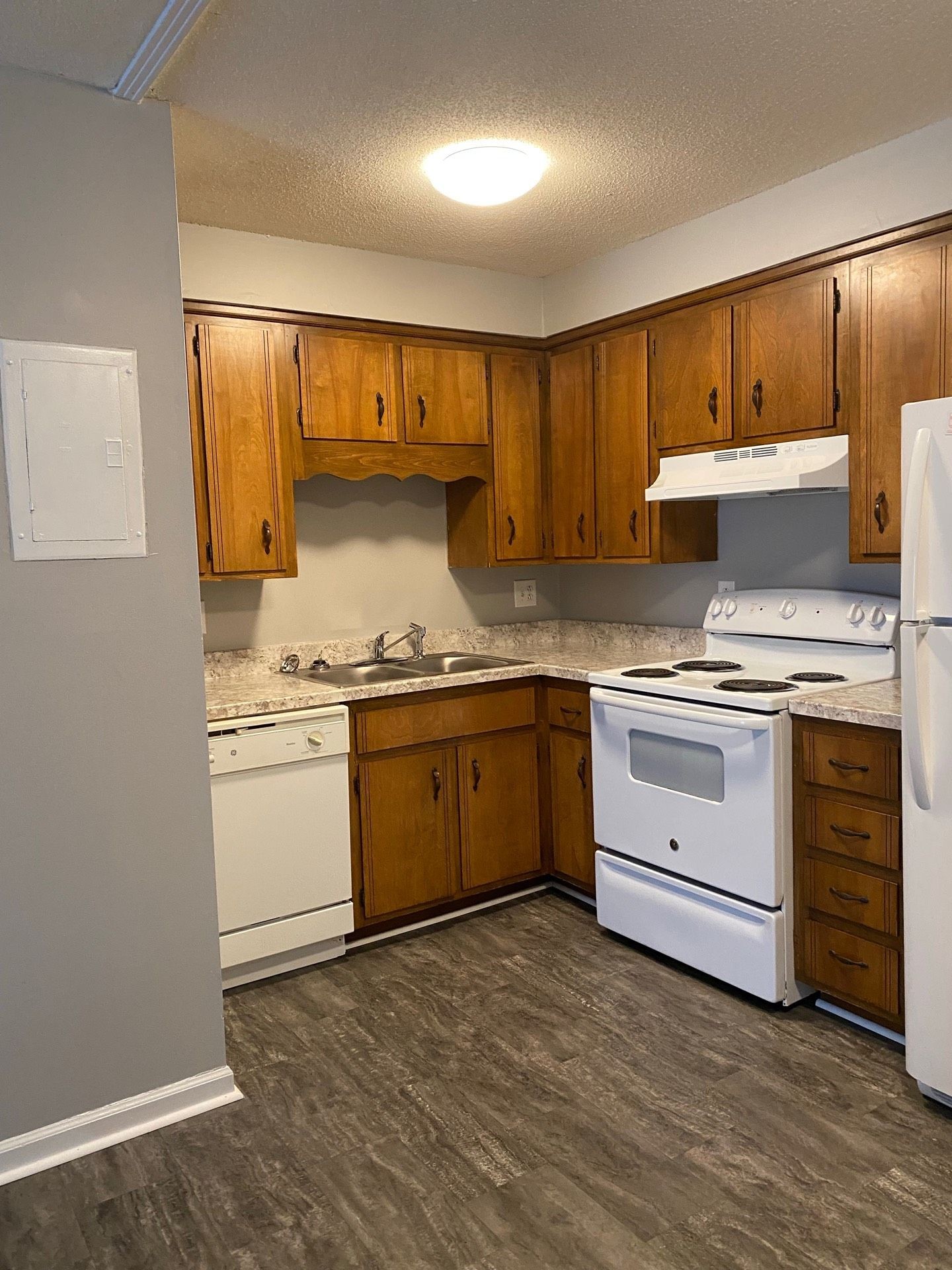 526 Main Street, Unit 6 Clarksville, TN 37040 - Photo 4 of 10 a kitchen with a stove top oven sink and cabinets