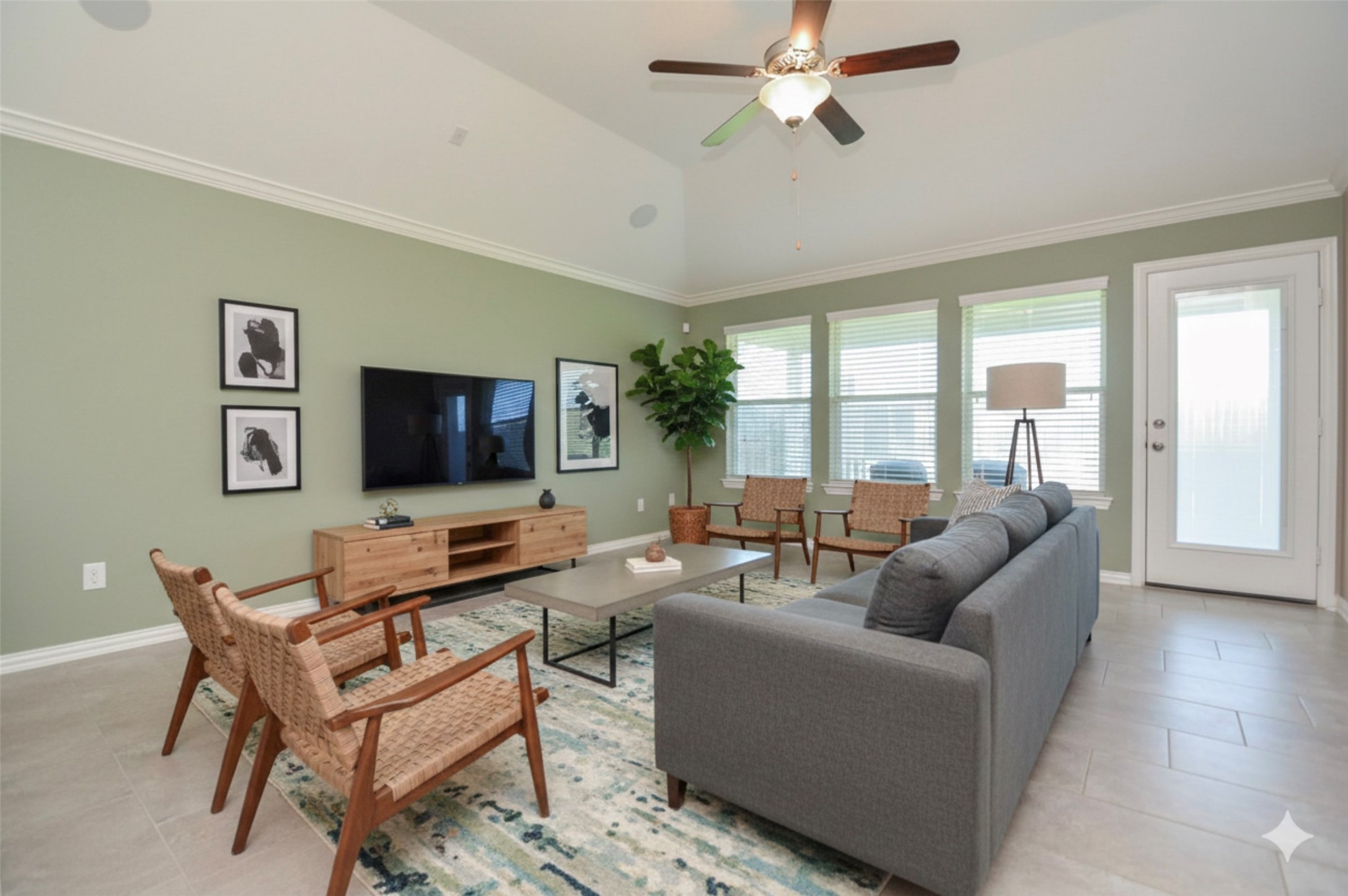 20414 Duncan Run Lane Cypress, TX 77433 - Photo 11 of 18 a living room with furniture a flat screen tv and a large window
