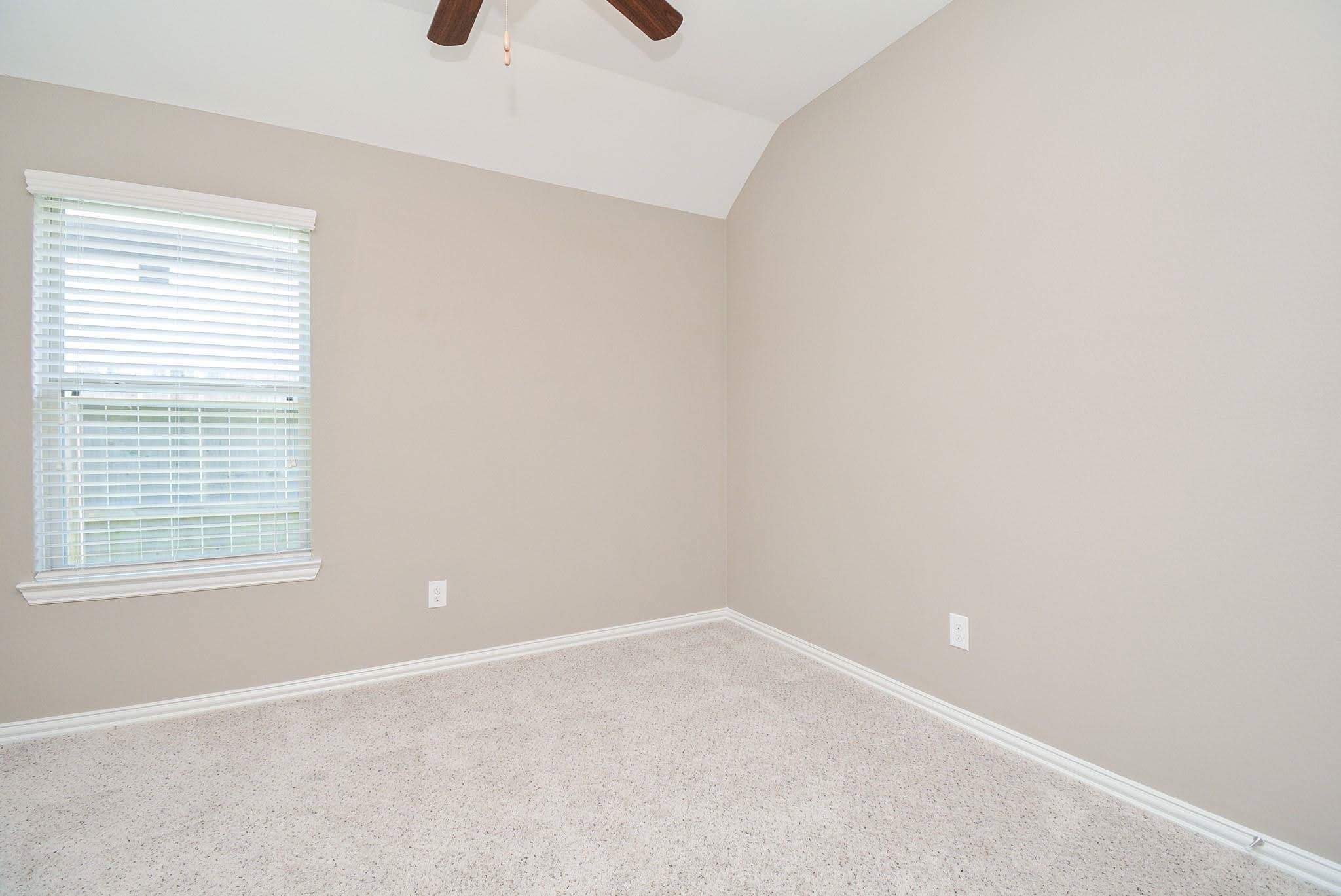 20414 Duncan Run Lane Cypress, TX 77433 - Photo 12 of 18 an empty room with a window