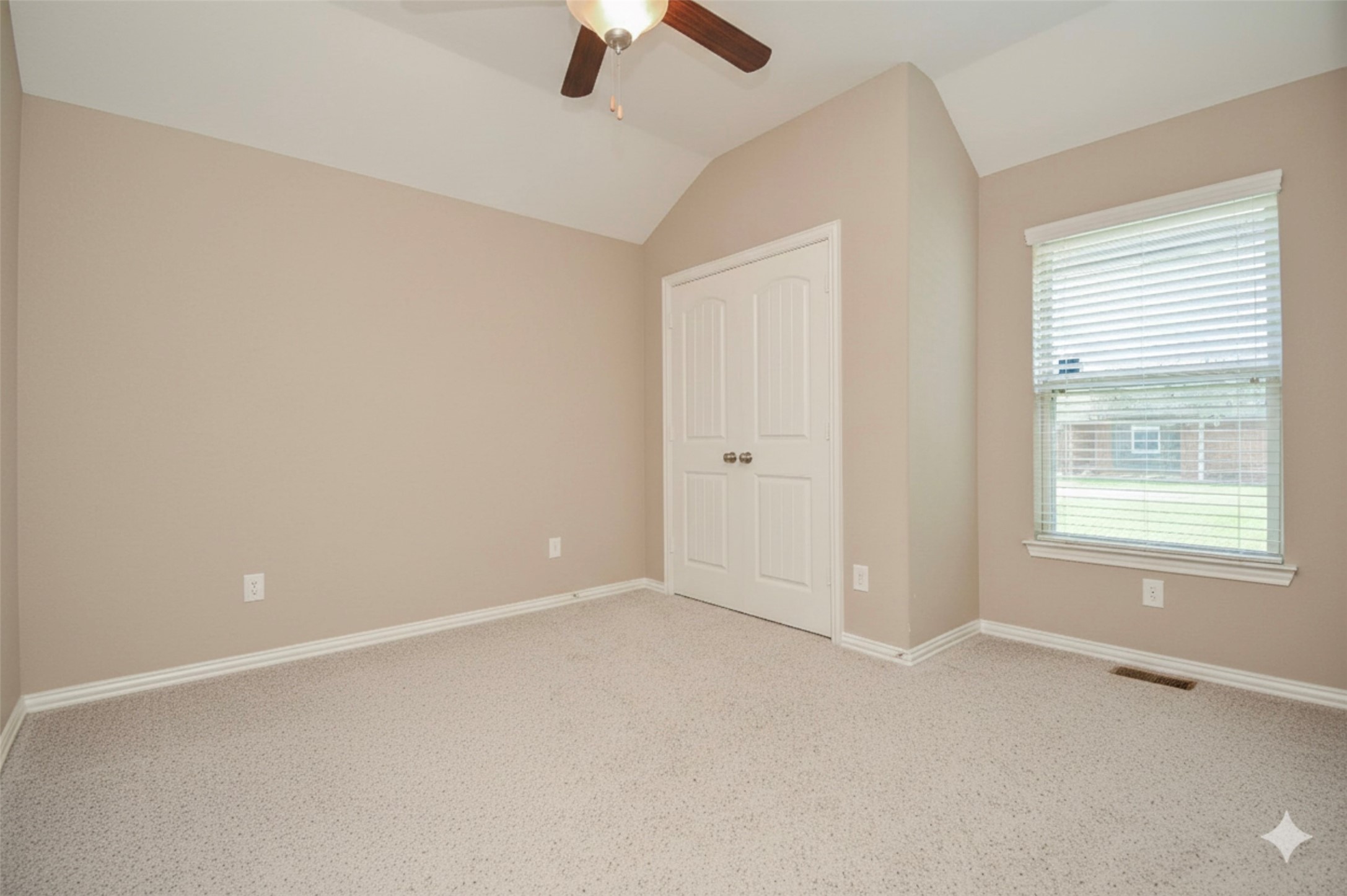 20414 Duncan Run Lane Cypress, TX 77433 - Photo 15 of 18 an empty room with a window and a fan