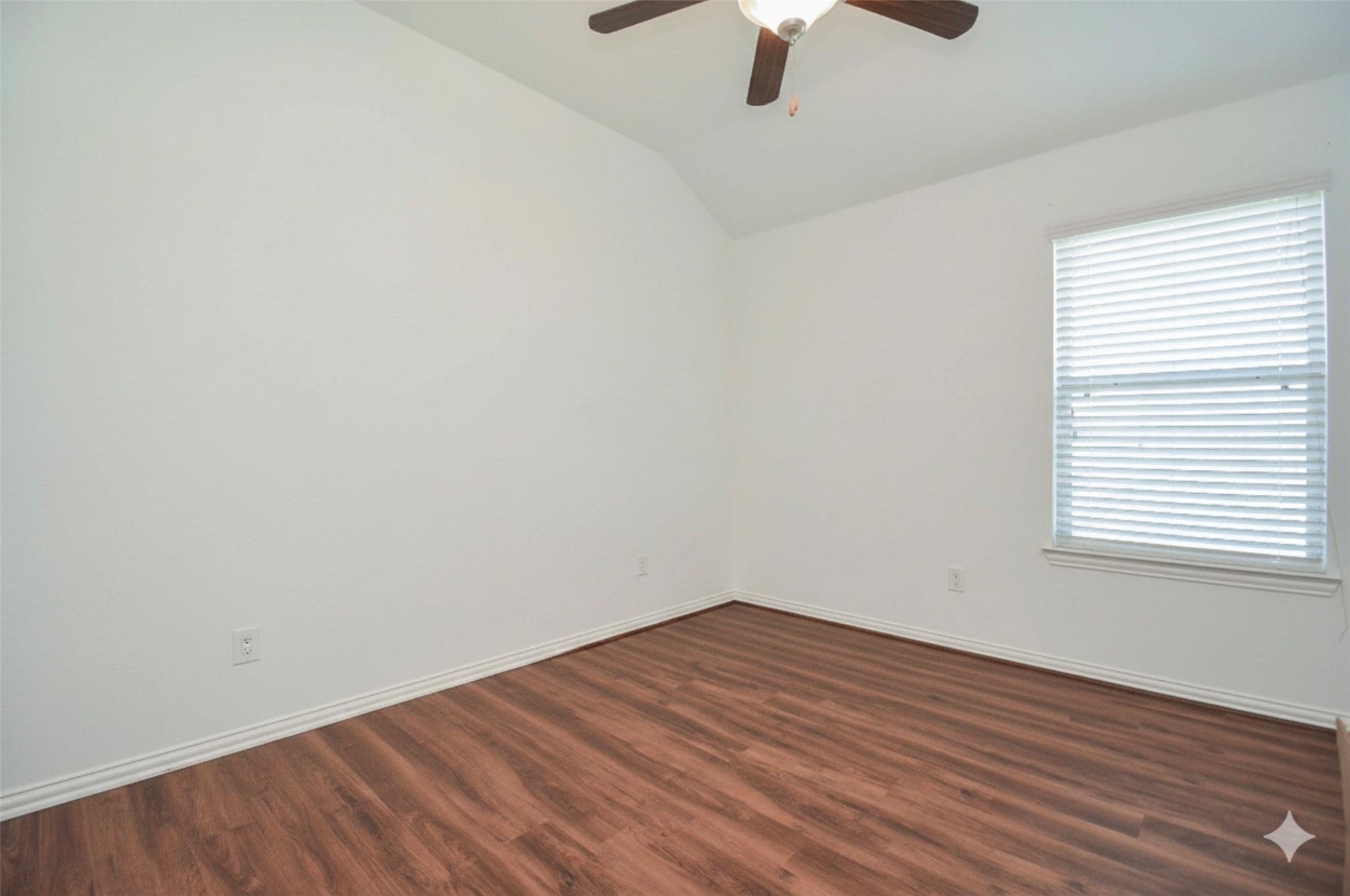 20414 Duncan Run Lane Cypress, TX 77433 - Photo 16 of 18 an empty room with a window and ceiling fan