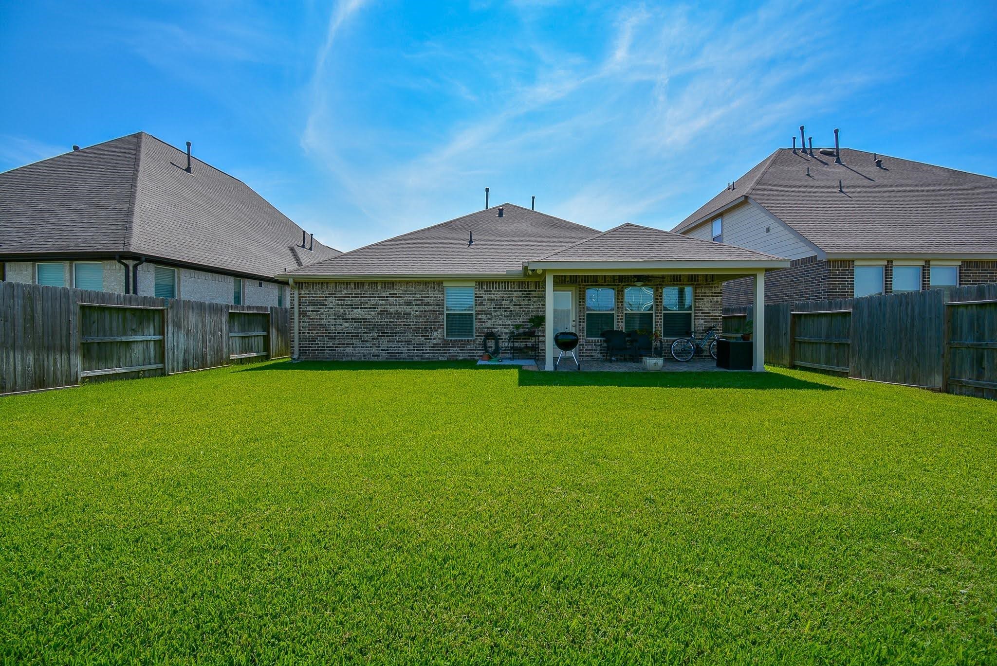 20414 Duncan Run Lane Cypress, TX 77433 - Photo 17 of 18 a front view of a house with a garden