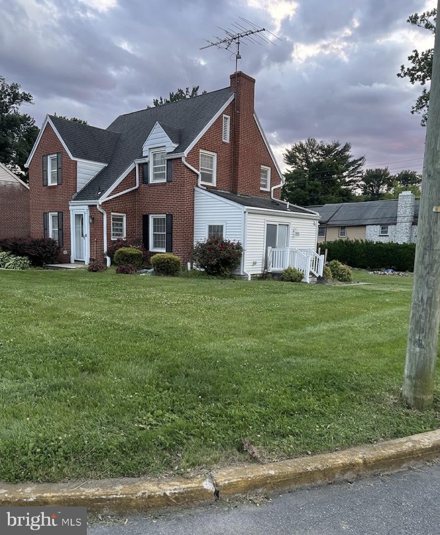 3540 Stoudts Ferry Bridge Road Reading, PA 19605 - Photo 2 of 3 Charming brick home with lush lawn.