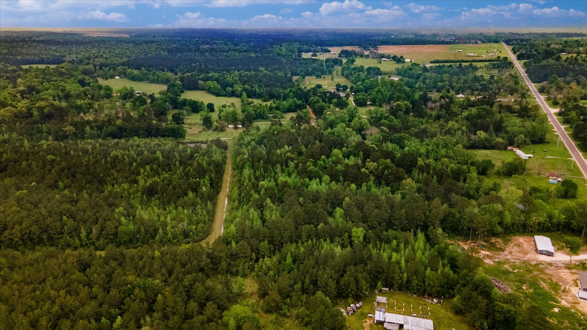 Tbd Shaw Road Hull, TX 77564 - Photo 7 of 31 an aerial view of a yard and mountain view in back