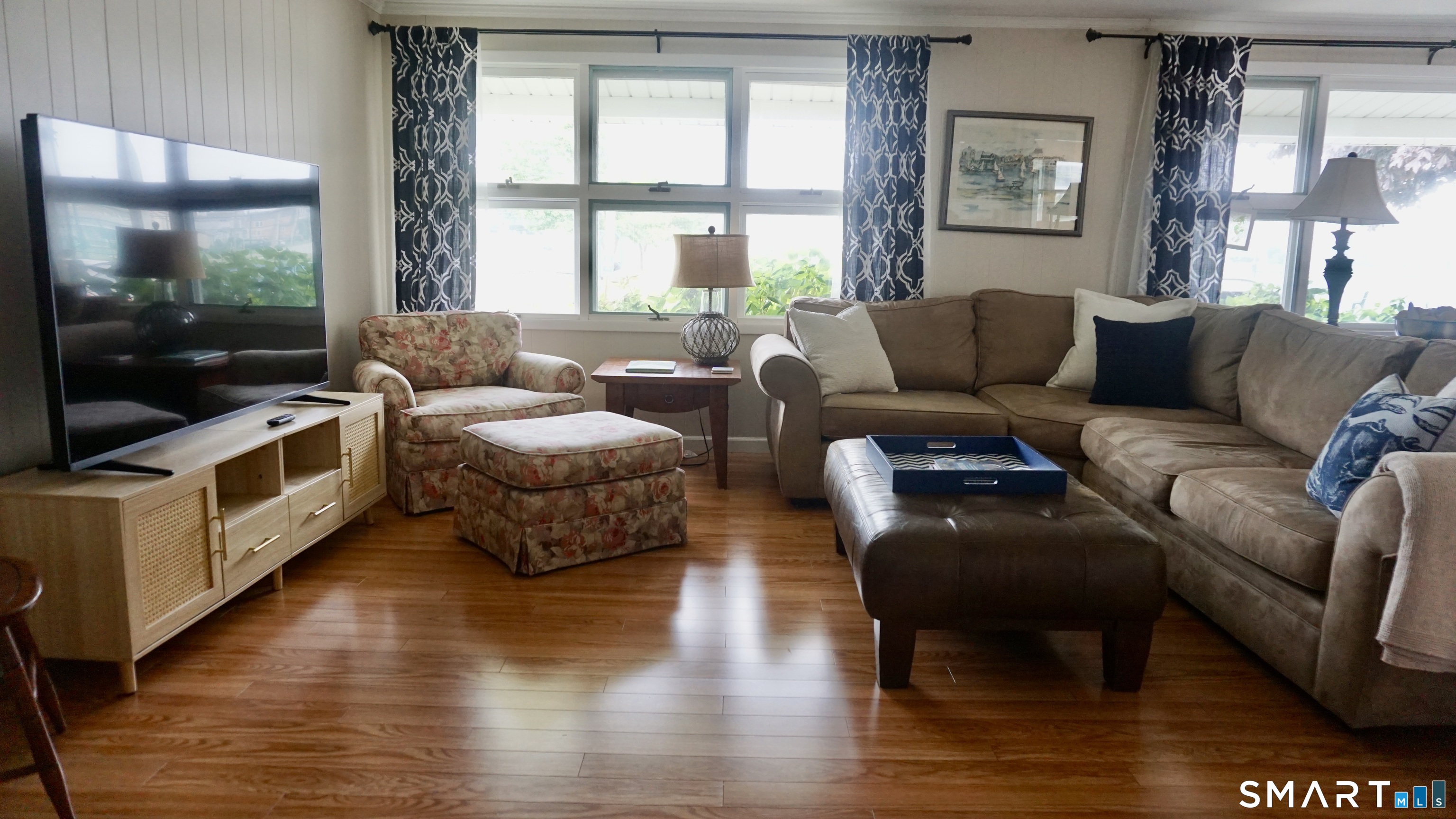 13 Pacific Street Groton, CT 06340 - Photo 10 of 31 a living room with furniture and a flat screen tv