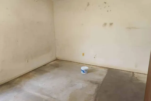 a kitchen with a cabinets and window