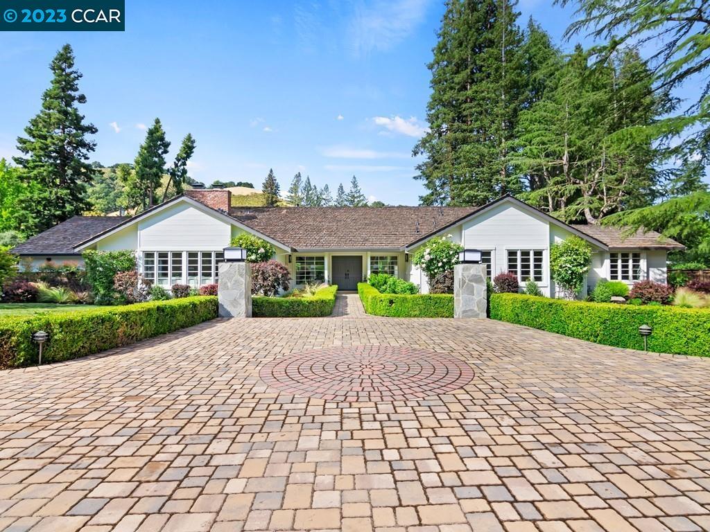 3732 Happy Valley Road Lafayette, CA 94549 - Photo 1 of 1 a front view of a house with a yard and potted plants