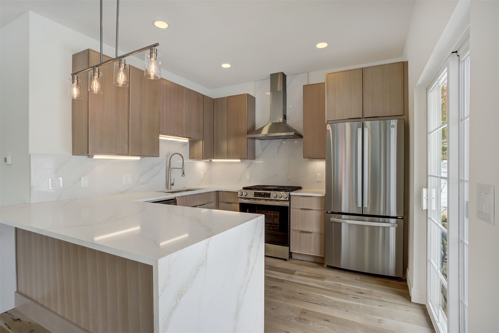 22 North Side Circle Silverthorne, CO 80498 - Photo 16 of 28 a kitchen with stainless steel appliances a refrigerator and a stove top oven