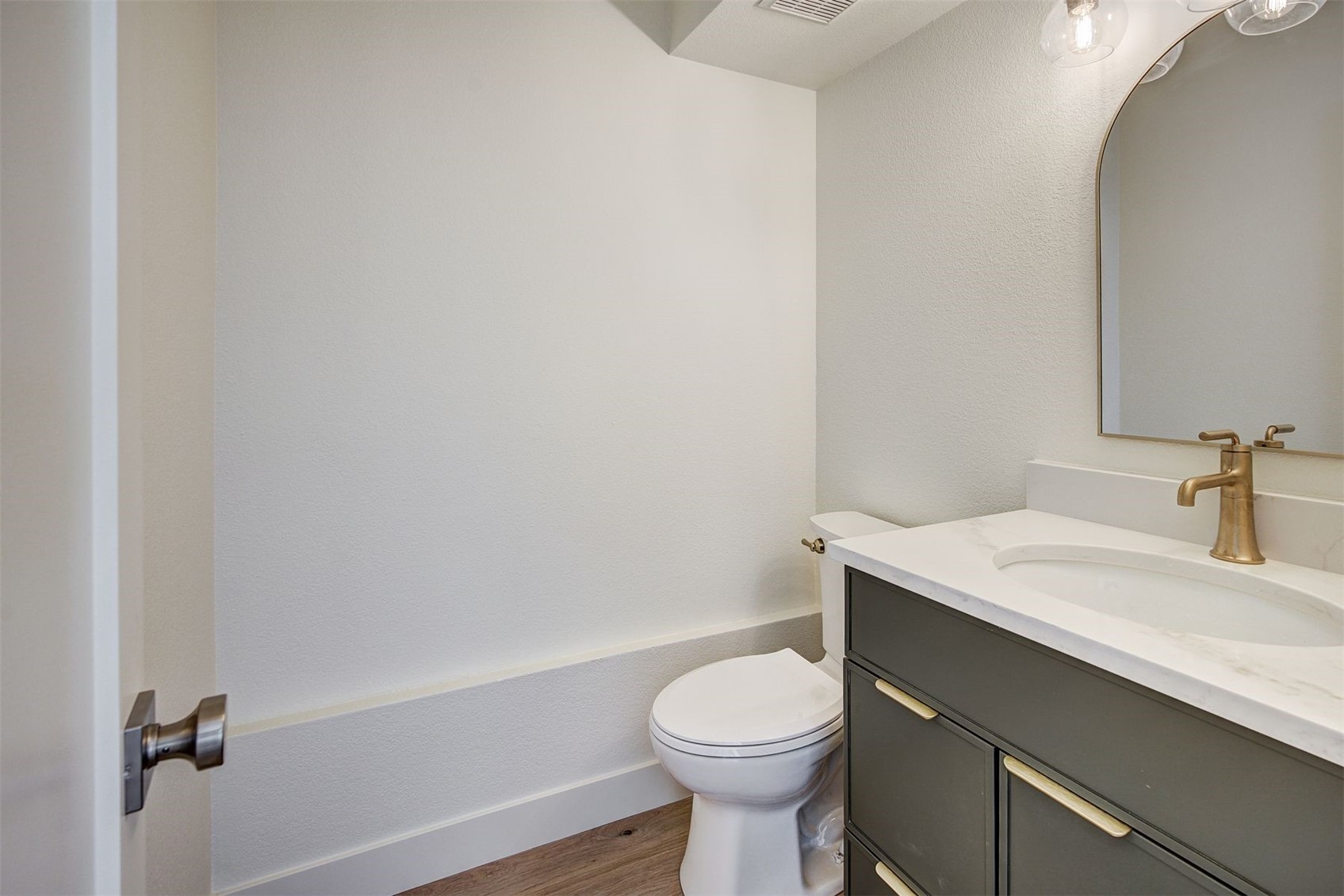 22 North Side Circle Silverthorne, CO 80498 - Photo 19 of 28 a bathroom with a granite countertop sink toilet and a mirror
