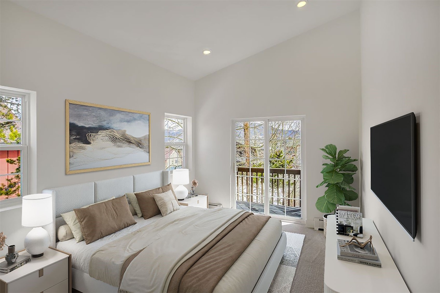 22 North Side Circle Silverthorne, CO 80498 - Photo 6 of 28 a bedroom with a balcony a bed and a flat screen tv