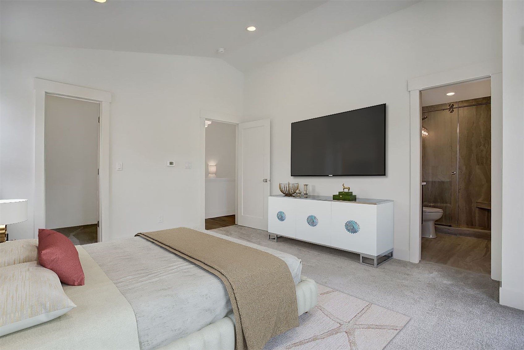 22 North Side Circle Silverthorne, CO 80498 - Photo 7 of 28 a bedroom with a bed and a flat screen television