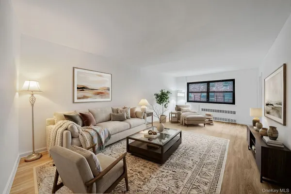 a living room with furniture or couch and a flat screen tv