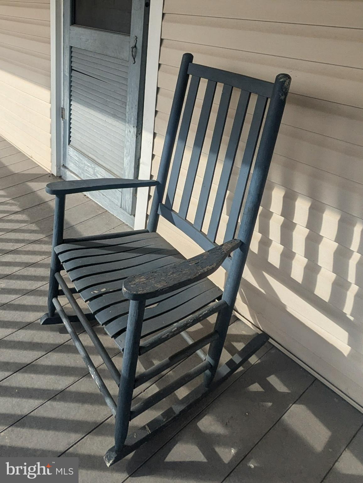 4 Nursery Road Berwick, PA 18603 - Photo 50 of 51 Sunlit porch with a classic rocking chair.