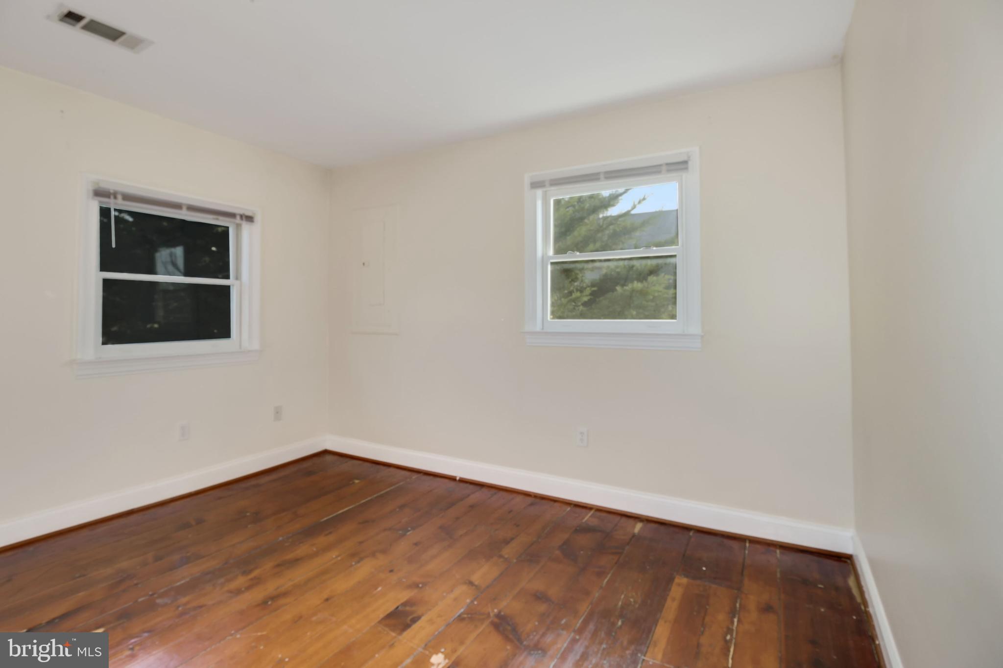 112 Main Street, Unit A New Windsor, MD 21776 - Photo 16 of 39 a view of a small space with wooden floor and a window