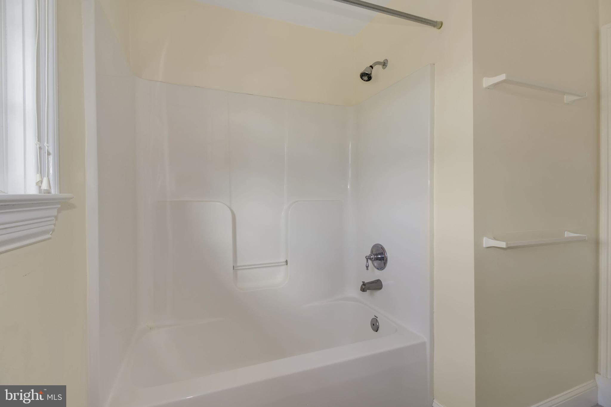 112 Main Street, Unit A New Windsor, MD 21776 - Photo 17 of 39 a bathroom with a bathtub