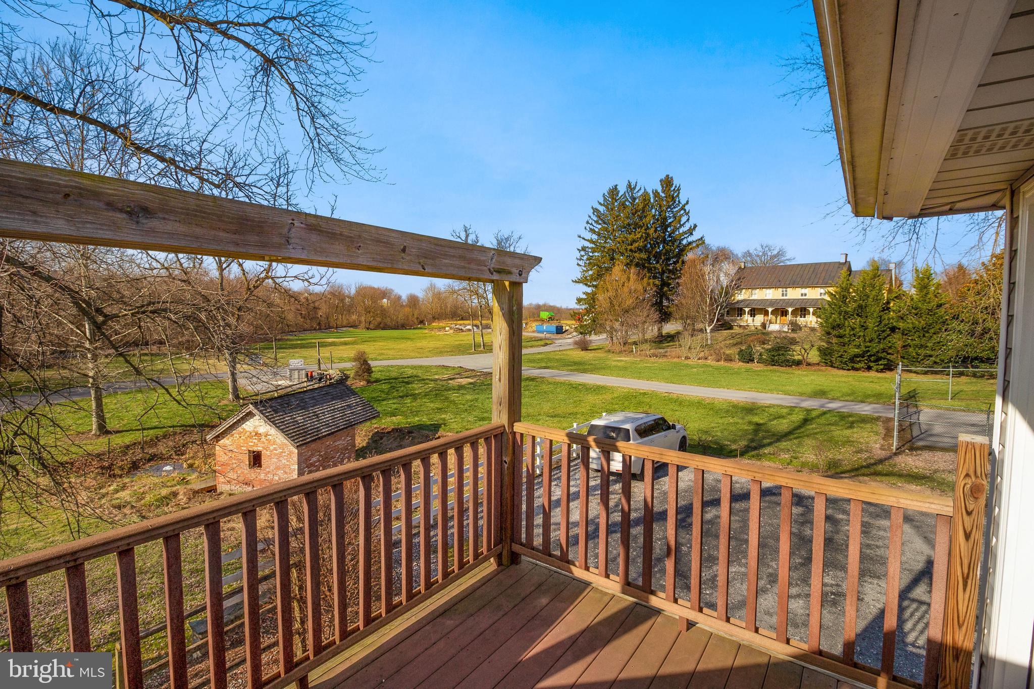 112 Main Street, Unit A New Windsor, MD 21776 - Photo 20 of 39 a view of a two chairs on the deck