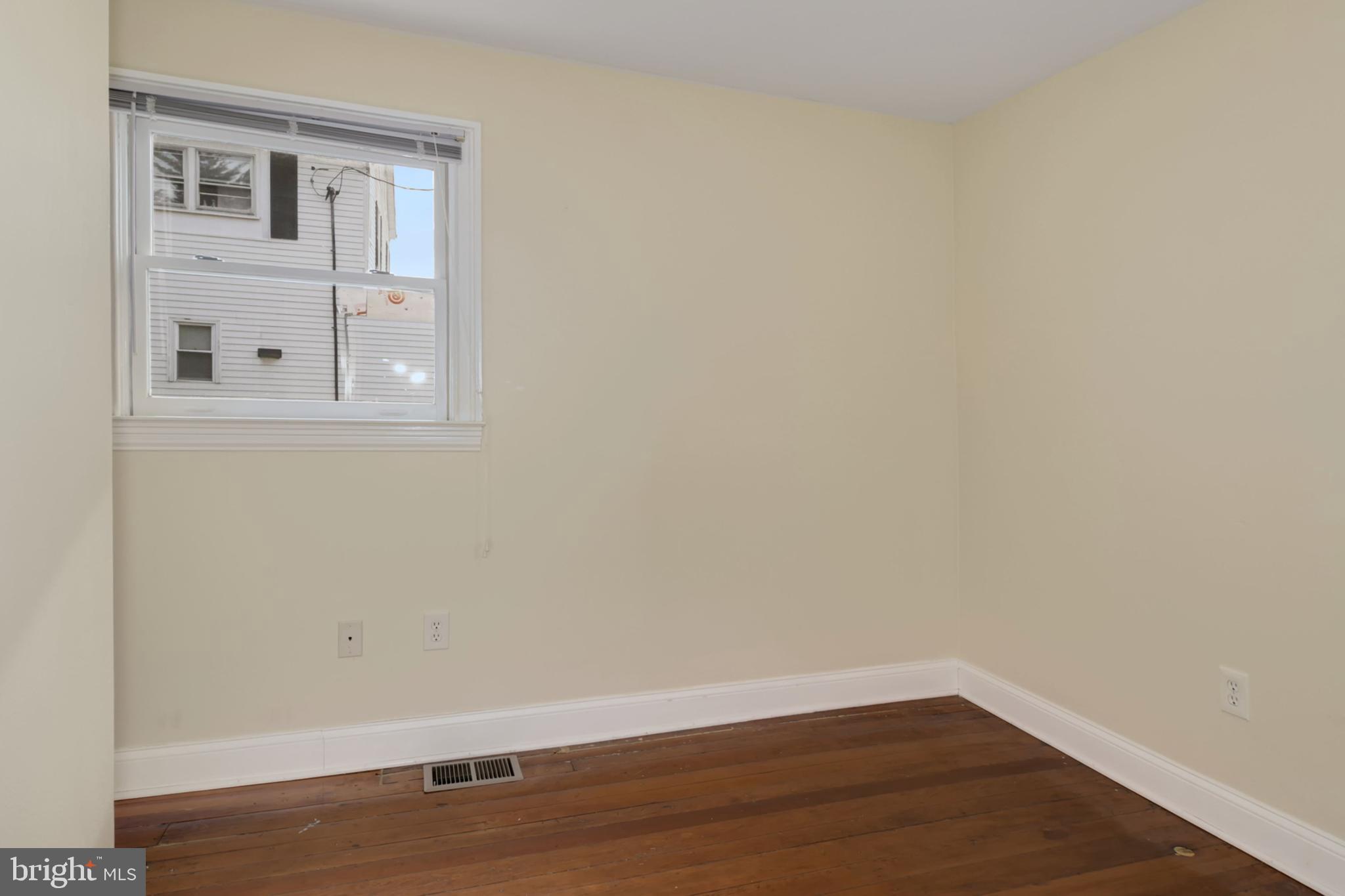 112 Main Street, Unit A New Windsor, MD 21776 - Photo 29 of 39 a view of a small space with wooden floor and a window