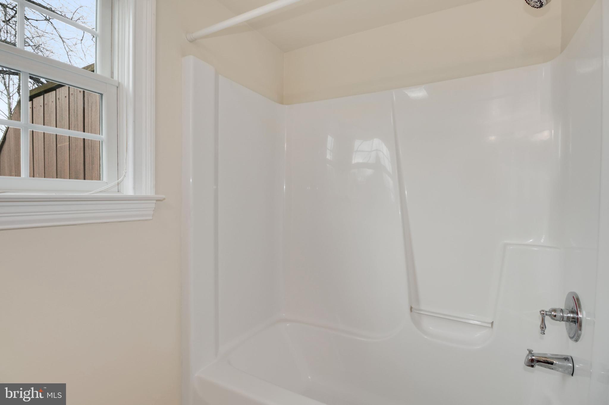 112 Main Street, Unit A New Windsor, MD 21776 - Photo 32 of 39 a bathroom with a bathtub