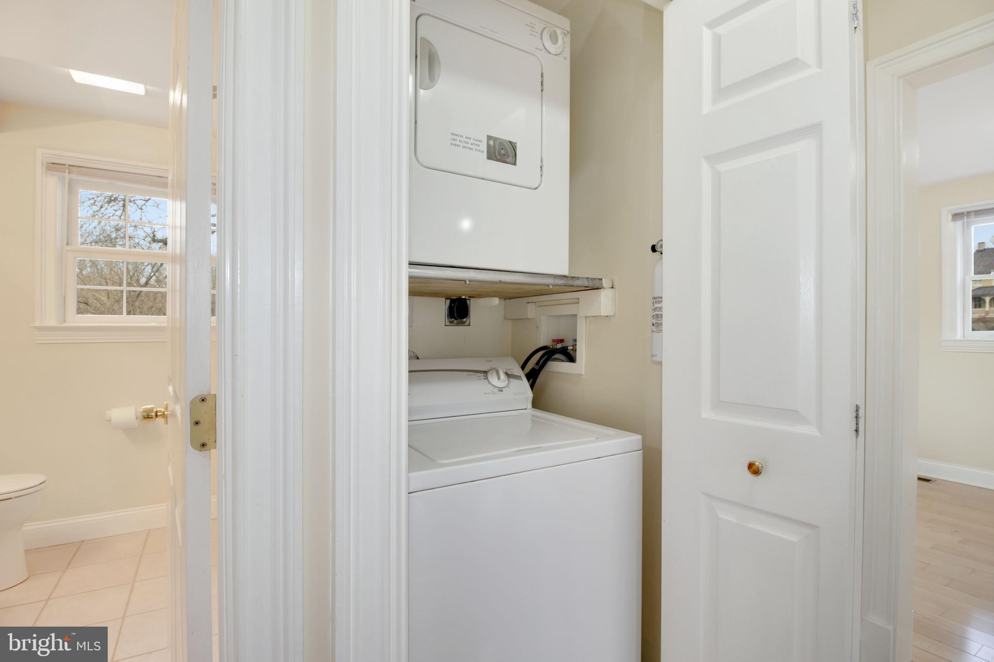 112 Main Street, Unit A New Windsor, MD 21776 - Photo 36 of 39 a bathroom with a sink a toilet and shower