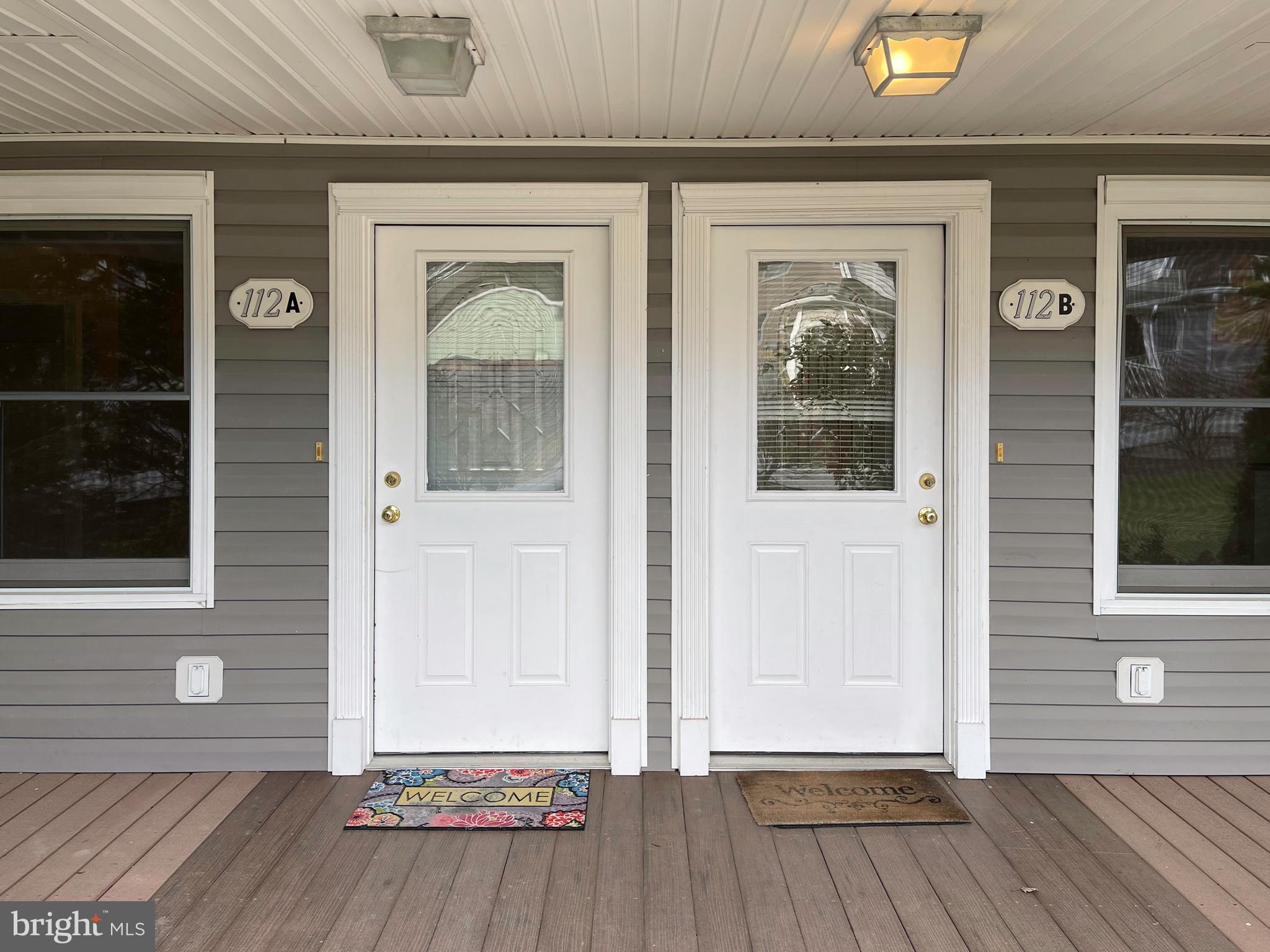 112 Main Street, Unit A New Windsor, MD 21776 - Photo 5 of 39 front view of a house with a glass door
