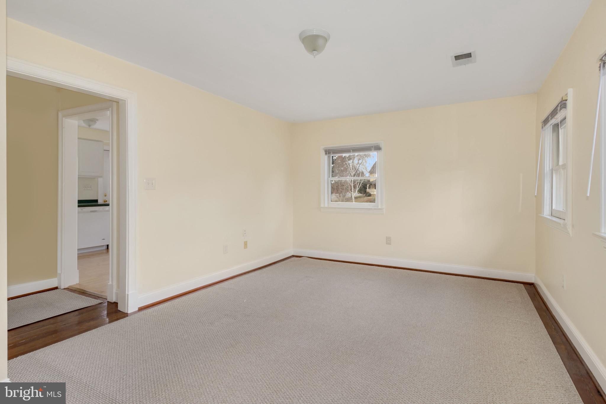 112 Main Street, Unit A New Windsor, MD 21776 - Photo 8 of 39 a view of an empty room with a window