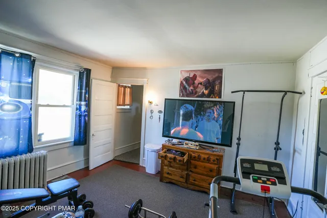 a room with furniture and a window