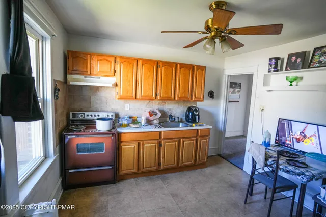 a balcony with chairs and a dinning table