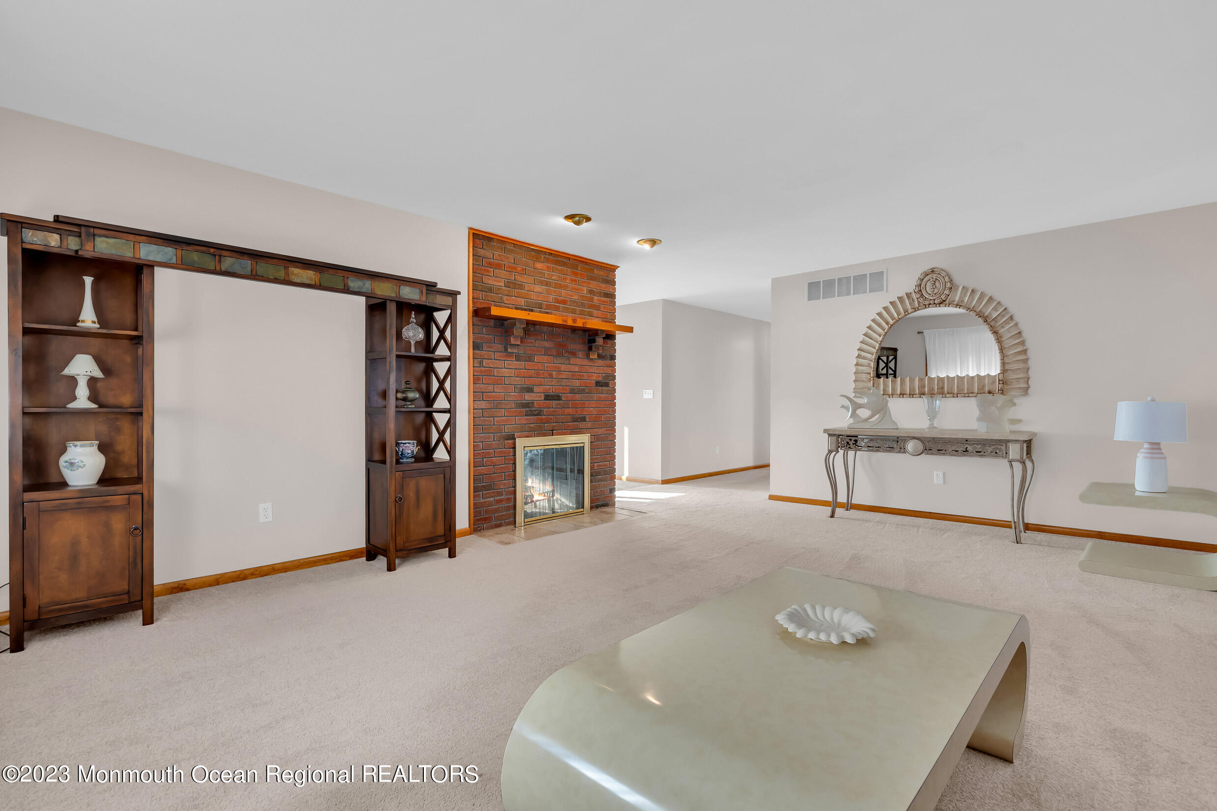 2 Channel Road Toms River, NJ 08753 - Photo 11 of 57 a view of a livingroom with furniture and natural light