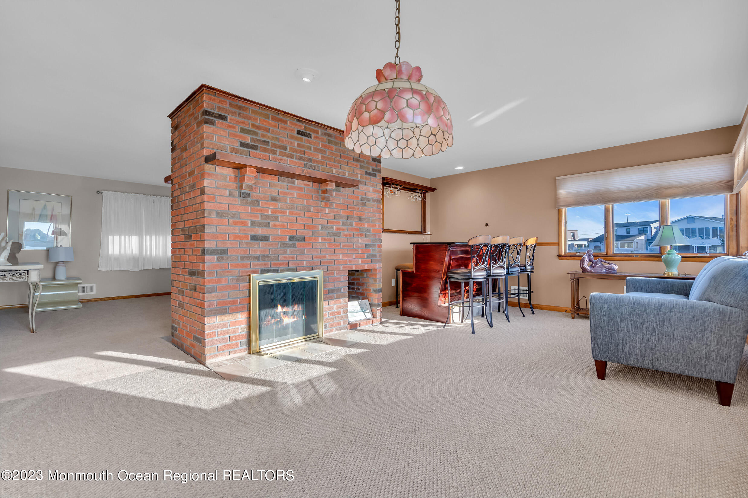 2 Channel Road Toms River, NJ 08753 - Photo 15 of 57 a view of a livingroom with furniture and a chandelier