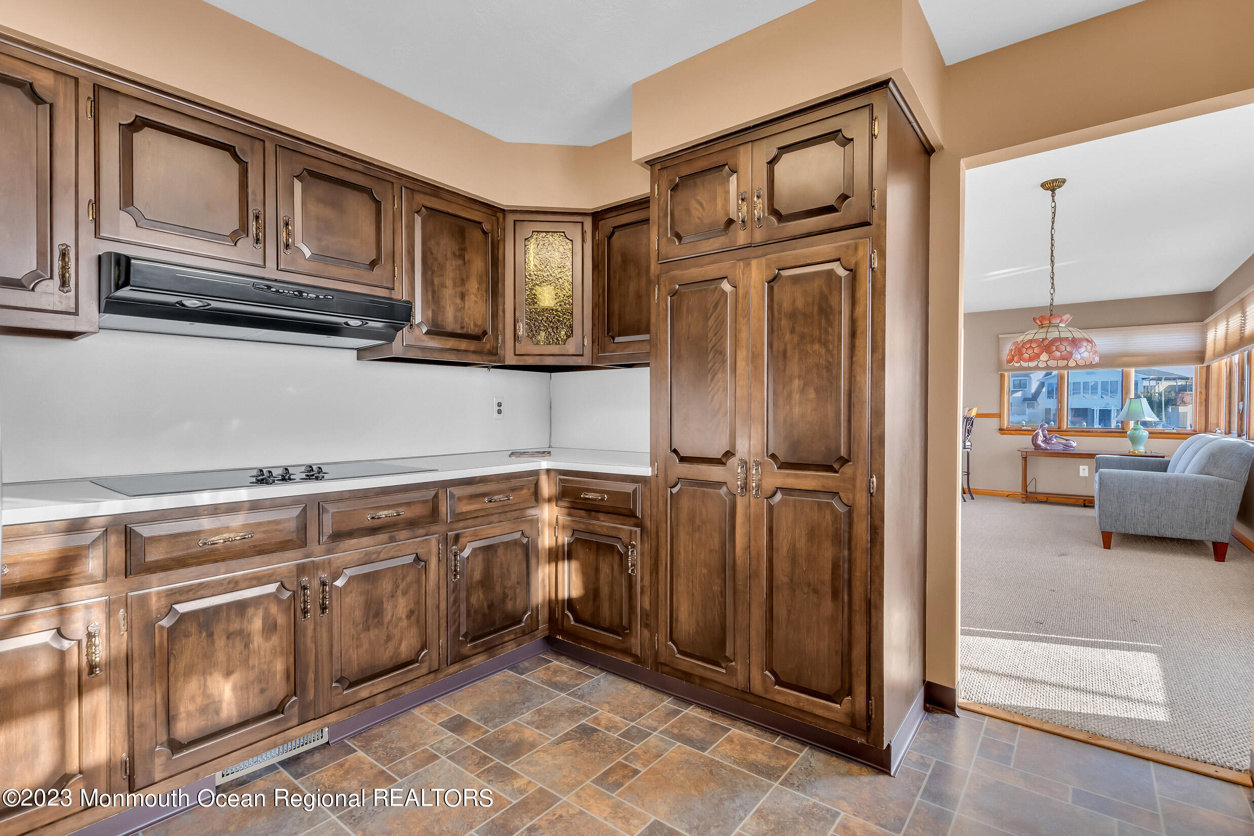 2 Channel Road Toms River, NJ 08753 - Photo 23 of 57 a kitchen with stainless steel appliances granite countertop a refrigerator and cabinets