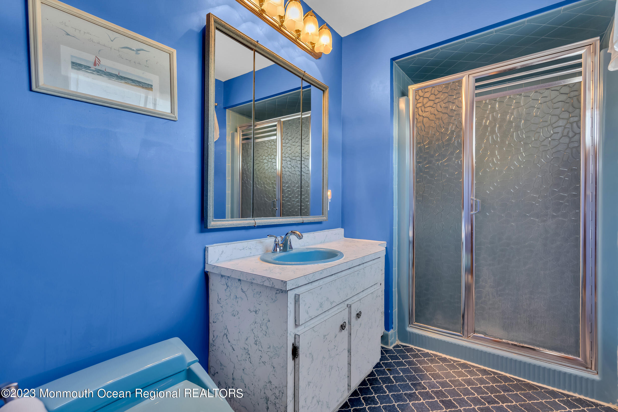 2 Channel Road Toms River, NJ 08753 - Photo 36 of 57 a bathroom with a sink and a mirror