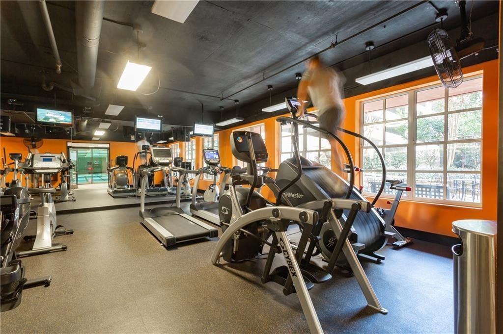 1101 Juniper Street Northeast, Unit 1416 Atlanta, GA 30309 - Photo 42 of 48 a view of a room with gym equipment