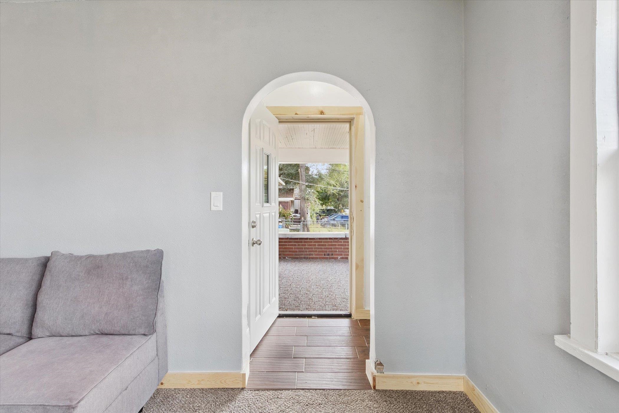 918 South 3rd Street Rockford, IL 61104 - Photo 10 of 27 a living room with furniture and a window