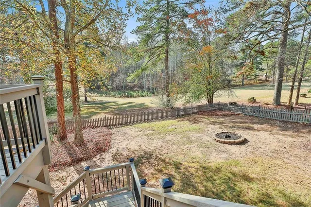 a bathroom with a toilet sink and shower