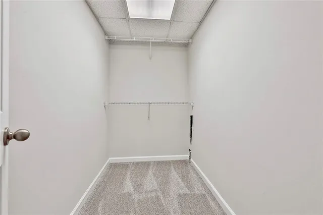 a view of swimming pool with trees