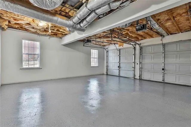 a view of road with large trees