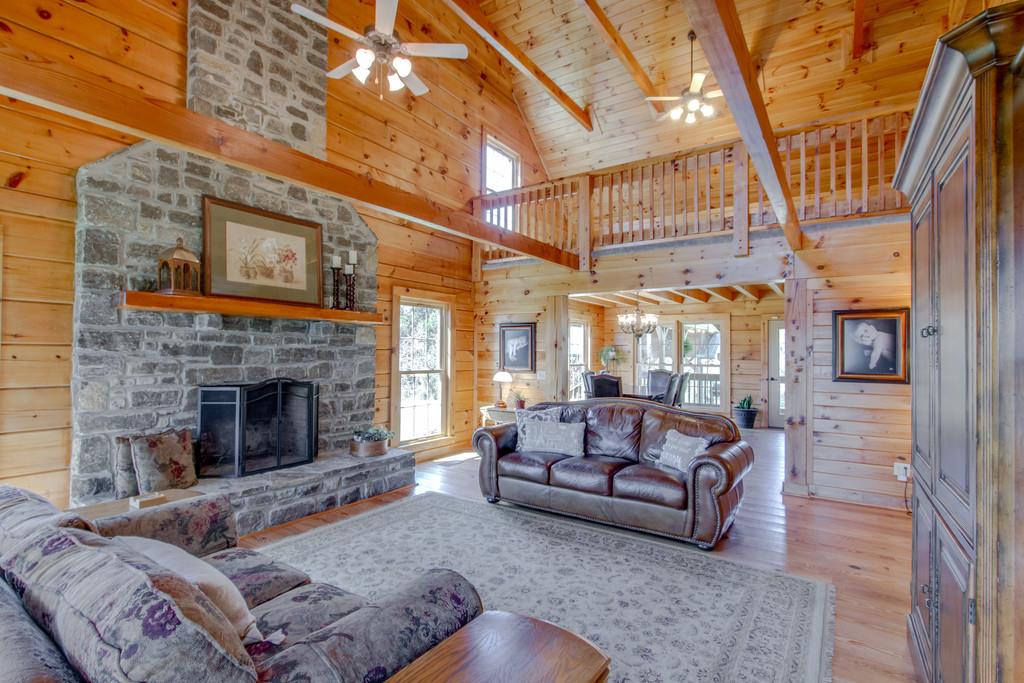 1567 Dillon Road Milton, TN 37118 - Photo 14 of 30 a living room with furniture and a fireplace