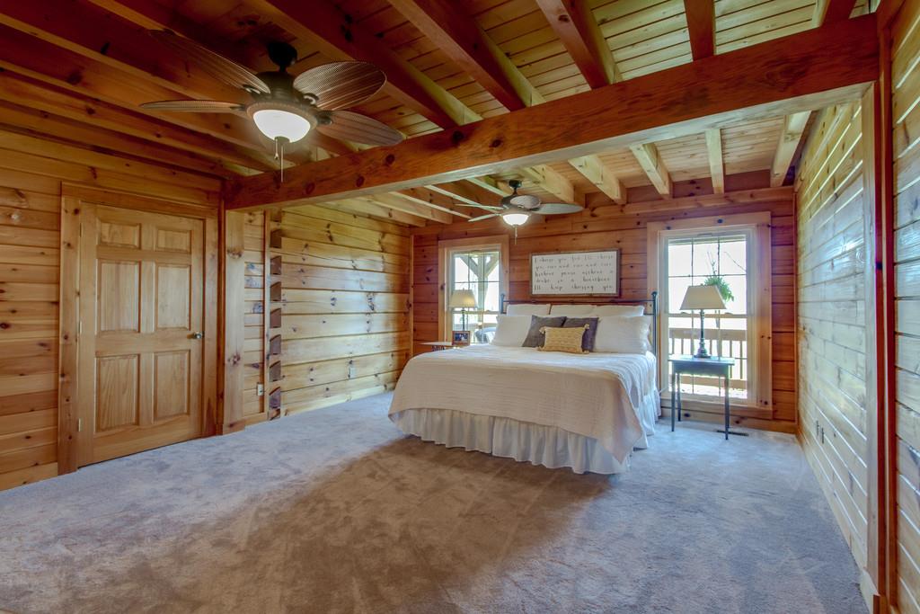 1567 Dillon Road Milton, TN 37118 - Photo 15 of 30 a spacious bedroom with a bed and a large closet