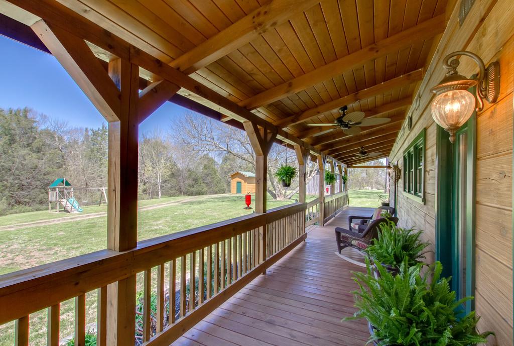 1567 Dillon Road Milton, TN 37118 - Photo 24 of 30 a view of a porch with wooden floor