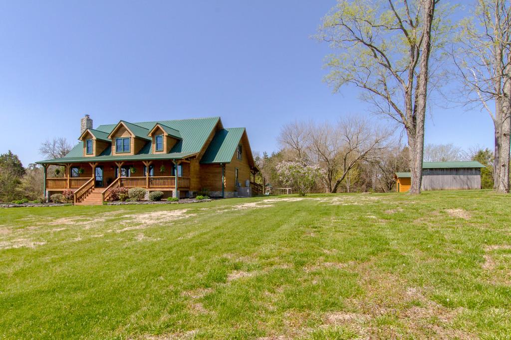 1567 Dillon Road Milton, TN 37118 - Photo 4 of 30 a view of a house with a big yard