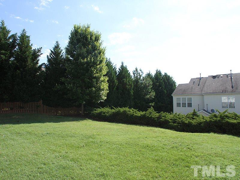 8458 Reedy Ridge Lane Raleigh, NC 27613 - Photo 11 of 12 a view of a backyard