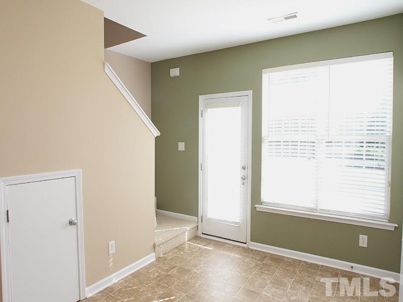 8458 Reedy Ridge Lane Raleigh, NC 27613 - Photo 5 of 12 an empty room with windows