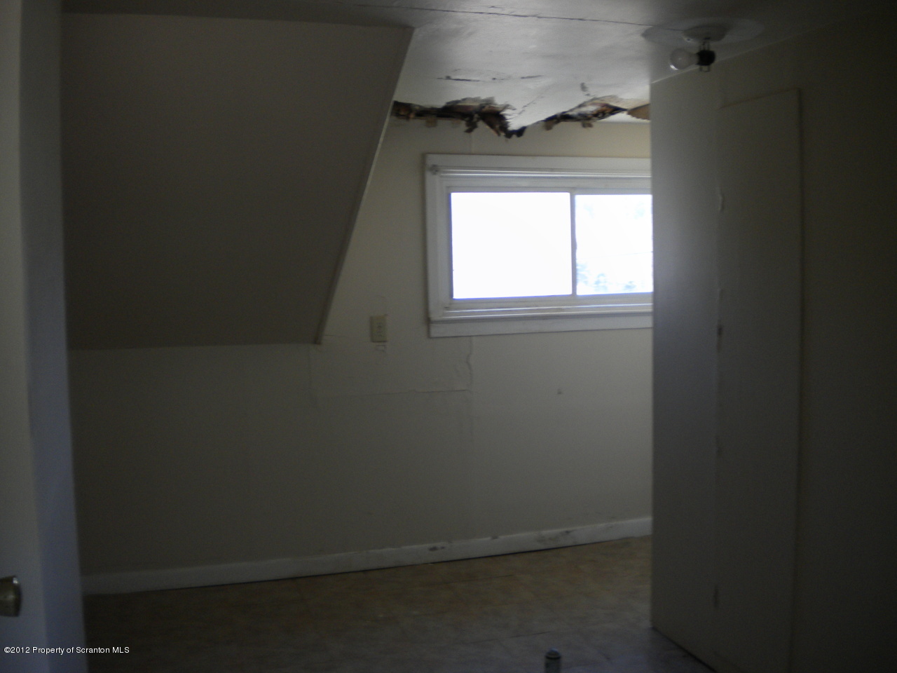 53 Lindaville Road Kingsley, PA 18826 - Photo 3 of 11 an empty room with a window
