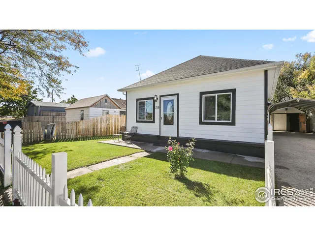 a black and white photo of a house