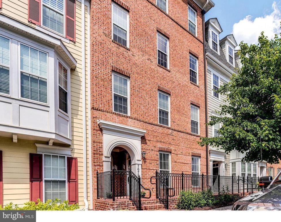 Charming brick facade with inviting entrance.