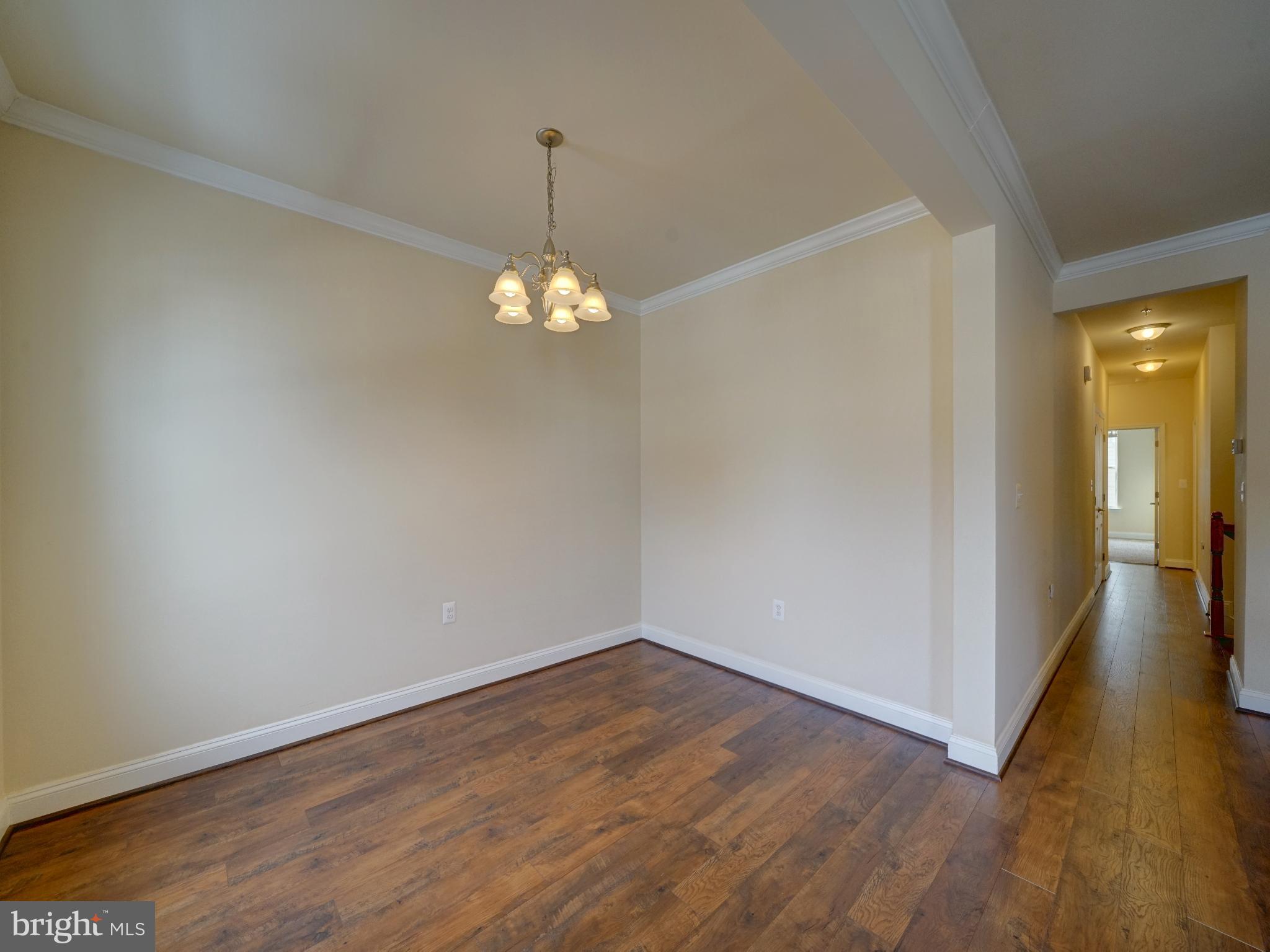 7672 Maple Lawn Boulevard, Unit 53 Fulton, MD 20759 - Photo 13 of 39 Spacious room with warm wooden floors.